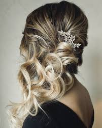 Create three or four small ponytails and then flip and pull through to create small twists for an elegant updo. Curly Wedding Hairstyles From Playful To Chic Wedding Forward