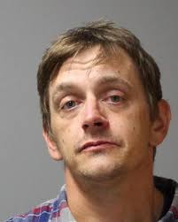 Police: Man trashes hotel room, swallows pills