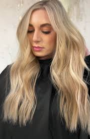 Daydreaming about this hair 😍 I did a full blonding service with some  corrective work to eliminate a warm band from some previous highlights.  Now, she has this buttery, bright, dreamy blonde ☁️