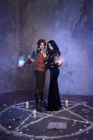The Witcher 3 Wild Hunt Triss And Yennefer Cosplay Gallery Character Profiles The cosplay photo really shows off yennefer's dark hair, mysterious jewelry, and striking eyes. the witcher 3 wild hunt triss and