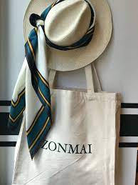 Visual Merchandising Inspiration To Shoot A Non Holiday Products Add Some Sumer Accessories Scarf Photography Scarf Photography Ideas Scarf Fashion Photography