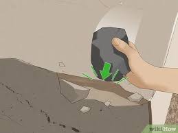 With one hand (the one that has been chalked), grip the axe at the bottom of its handle. How To Make A Stone Axe Wikihow