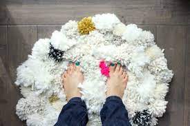 I had so much fun making this rug and my dog seems to love it!where to buy (not the exact yarns i used as i can't. How To Make A Diy Pom Pom Rug Make Do Crew