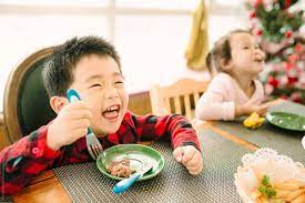 See more ideas about christmas dinner, christmas food, food. Kids Having Christmas Dinner At Home By Maahoo Studio Christmas Dinner