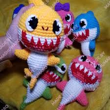 These shark crochet patterns are super cute and baby shark hair bow and bow tie pattern for the shark themed birthday party. Baby Shark Family Crochet Toys Free Crochet Patterns Amigurumi Crochet Baby