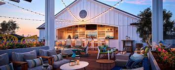 Rooftop bar with bay and ocean views. Newport Hotel On The Beach Lido House Autograph Collection