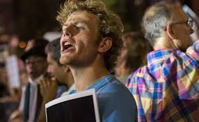 White allies' protest Stockley verdict outside Billy Joel concert at Busch  Stadium