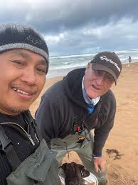Waitpinga beach river flowing with small salmon trout