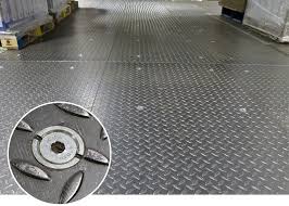 Contractors Used Lindapter S Ce Marked Hollo Bolt To Secure A Second Layer Of Chequer Plate Flooring In Order To Reinforce The Fact Factory Floor Flooring Bolt