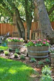 The Polished Pebble The Lavender Garden Part Ii Wine Barrel Garden Wine Barrel Planter Barrel Garden Ideas