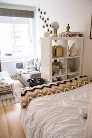 A Designer S 490 Square Foot Studio Transforms Into A Festive Wonderland Studio Apartment Living Apartment Layout Studio Apartment Layout