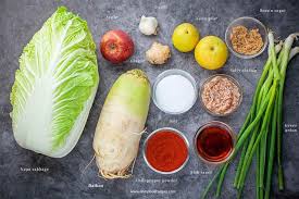 Kimchi is a traditional korean dish of fermented vegetables, the most common of which are napa cabbage and daikon radish (but check out other types of kimchi).in addition to being served as banchan, korean side dishes presented as part of a meal, it can also be used in a variety of cooked dishes. How To Make Easy Kimchi ê¹€ì¹˜ Oh My Food Recipes