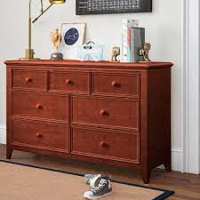 Perfect for your bedroom or for storage in other rooms of the home, solid wood dressers and chests of drawers are most commonly used to store clothing and textiles, but are easily used to store other items as well. Three Posts Teen Poulan 7 Drawer Solid Wood Dresser Reviews Wayfair