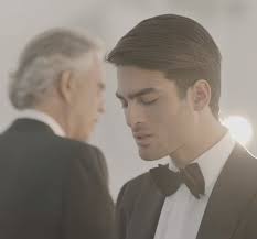 Man rocks the stage with kids' choir bringing 'Bohemian Rhapsody' to whole  new level