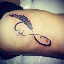 It expresses how loved the person was. Tattoo Uploaded By Isabel Firsrtattoo Love Live S Feather Infinity 271908 Tattoodo