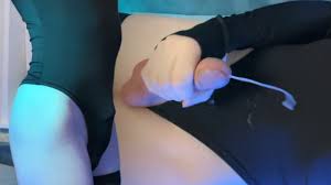 Femboy jerks off in a swimsuit and cums on tummy