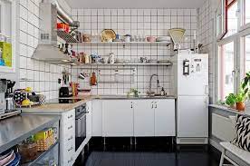 Appealing 550 Square Feet Home Design With Stainless Tabletop With Rack Wall Mounted Kitchen Rack White Ceramic Tiles Backsplash Corner Refrigerato Pinteres