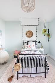 Washed hardwood floors ground this modern bohemian look in a teen's bedroom. Tween Girl Beachy Boho Bedroom The Lilypad Cottage