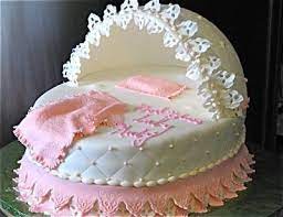 Come down to the shop to meet with one of the owners for a custom cake design consultation. Bassinet Baby Shower Cake Baby Shower Baby Cake Baby Shower Cakes Baby Girl Cakes