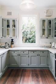 The light cabinets and dark floors combination can be very effective whether your style is contemporary or traditional. What Wood Floor Colors Are Outdated American Farmhouse Lifestyle