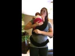 I would suggest go to a baby store like natural resources to try them on and pick the one that works best for you How To Put On A Baby K Tan Youtube