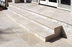 Limestone is a durable stone commonly used indoors for tile, countertops and floors, but outside, it is generally used as edging along a garden or pathway or as pavers. Devonshire Limestone Paving And Stairs Stratum Finish Stone Porches Exterior Stairs Porch Steps