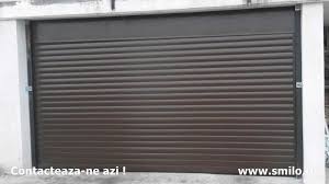 Pentru a realiza cel mai ieftin acoperis, poti bate scanduri una langa cealalta si le poti inveli cu policarbonat sau cu un cauciuc ceva. Usi Garaj Tip Rulou Ieftine Smilo Holding Www Smilo Ro Youtube