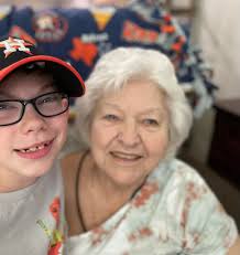 Can someone edit a photo of my mom for an obituary?