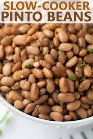 Slow cooker pork and beans combine a pound of dried pinto or pink beans with a small pork loin roast for a delicious meal of pork and beans. Slow Cooker Pinto Beans Meaningful Eats