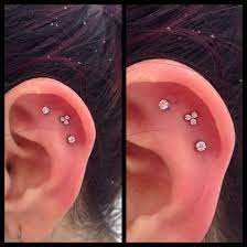 Outer Conch Piercing With Prong Set And Trinity Cz From Neometal Pretty Ear Piercings Earings Piercings Outer Conch Piercing