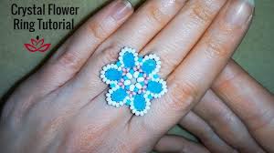Then, pick up four more beads, make a circle by stitching through the first of the two beads, add a center bead, and stitch across the circle through the bead on the opposite side. Blue Marque And White Seed Beads Flower Ring Rings Statement Rings Satolojistik Com