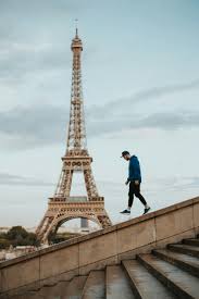 Man Posing in Front of the Eiffel Tower in Paris, France · Free Stock Photo
