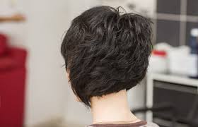 Coupled with bangs, center or side partings, or anything else that a stylist can think of, wedge haircuts remain very versatile. The Difference Between A Stack Hairstyle And The Wedge