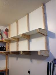 It is also often used in kitchens and interior cabinets, wall shelving systems typically consist of supporting bands that are installed along. Build Diy Garage Floating Shelf Diy Cost Of Building A Wood Fence Garage Storage Shelves Diy Garage Storage Shelves Diy Overhead Garage Storage
