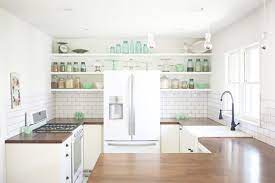 Cream colored kitchen cabinets with white appliances. 8 Kitchen Trends That Will Last Timeless Kitchen Trends