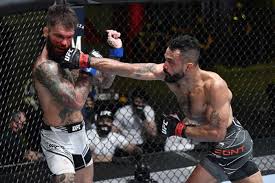 Johnny walker elbows khalil via www.mmamania.com. Ufc Fight Night Results Rob Font Outstrikes Cody Garbrandt To Net Career Best Win Dazn News Us