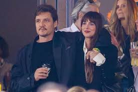 Dakota Johnson Reveals Why Pedro Pascal Is Always Stealing Her Clothes
