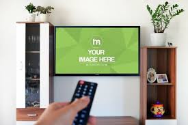 Lying On The Couch And Watching Tv That S Exactly What This Guy Is Doing An Online Mockup Template Featuring A Man Living Room Wall Mockup Template Smart Tv