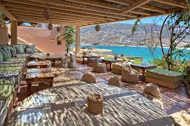 Hip Spots Best Restaurants Bars Beach Bars In Mykonos Beach Bars Beach Lounge Mykonos