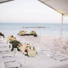The Black Tie Nassau Beach Wedding Reception On The Beach Featured Beautiful Florals White Linens And Our Signature Wedding Venues In Bahamas In 2019 B