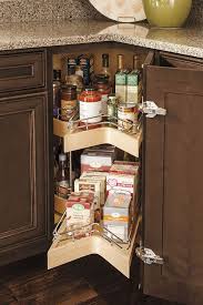 Maximizing The Efficiency Of Corner Storage Space Is The Job Of The Lazy Susan Cabinet With Pullou Small Kitchen Cabinets Kitchen Cabinets Kitchen Design Small