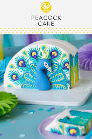 You Ll Be Struttin Your Stuff After You Make This Pretty In Peacock Cake Decorated With Lovely Buttercream Feathers Peacock Cake Savoury Cake Cake Decorating