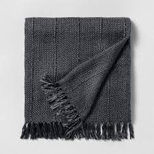The magnolia home pieces available at bed bath & beyond are similar to the ones being offered at pier 1 (read: Chunky Stripe Fringe Throw Blanket Hearth Hand With Magnolia Target