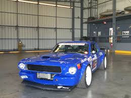 Image result for Canard Blue 1966 Mazda