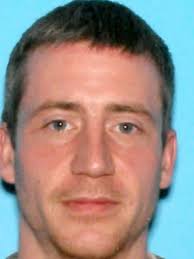 A photo of my Pepe (John R. LaValley, Sr.) at their house at 98 Washington  Street in Penacook. He was an Auxillary Concord Police officer. I remember  him mostly being stationed around