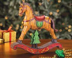 Shirley is kicking your average stocking up a notch by creating a diy christmas stocking centerpieces that can be placed on your table. Christmas Rocking Horse From Collections Etc Rocking Horse Christmas Props Wood Rocking Horse