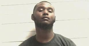 Suspect nabbed in quadruple shooting whose victims included girls ages 5  and 7