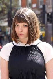 With a handful of bobby pins, you can create a messy and classy half up hairstyle. Bangs For Round Faces 34 Flattering Looks We Love All Things Hair Us