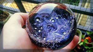 Galaxy Orb With Cremains Asteroid Belt And Glow In The Dark Stars Glass Cremation Urns Paperweights And M Cremation Ashes Memorial Paperweights Artful Ashes