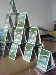 You can go two ways with this one, you can add another triangle and top it with one card laying on top (1),or you can lean 2 more cards on the open sides of the triangle (2). How To Using Techniques Ish Make A House Of Cards 3 Steps Instructables